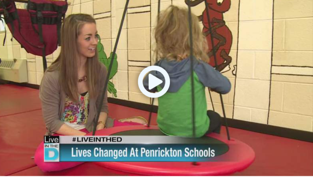 Image from video LIves Changed at Penrickton School of child playing on a swing.